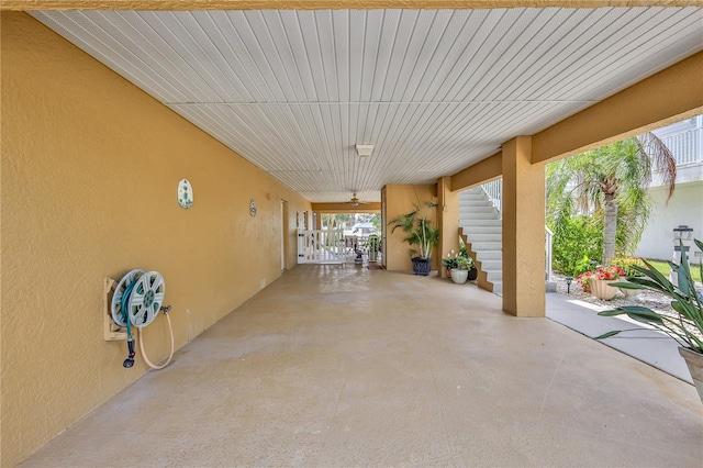 4460 Flounder Dr, Hernando Beach, FL 34607 - view of patio with stairs and an attached carport