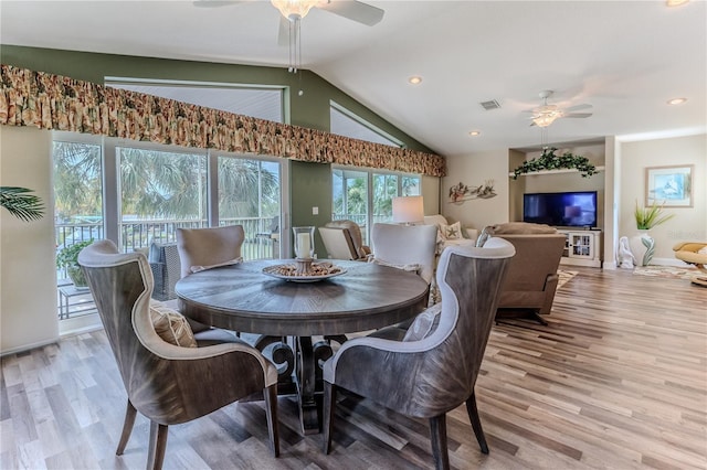 4460 Flounder Dr, Hernando Beach, FL 34607 - dining room featuring a ceiling fan, lofted ceiling, light wood-style floors, and recessed lighting