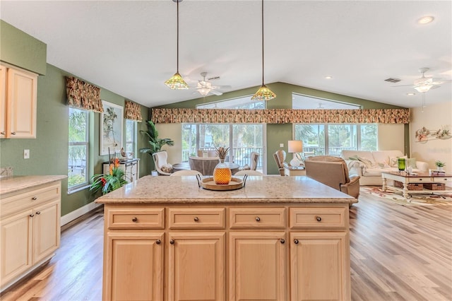 4460 Flounder Dr, Hernando Beach, FL 34607 - kitchen featuring a ceiling fan, vaulted ceiling, light wood-style flooring, plenty of natural light, and recessed lighting