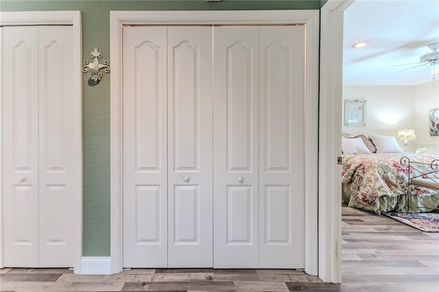 4460 Flounder Dr, Hernando Beach, FL 34607 - bedroom featuring wood finished floors and multiple closets