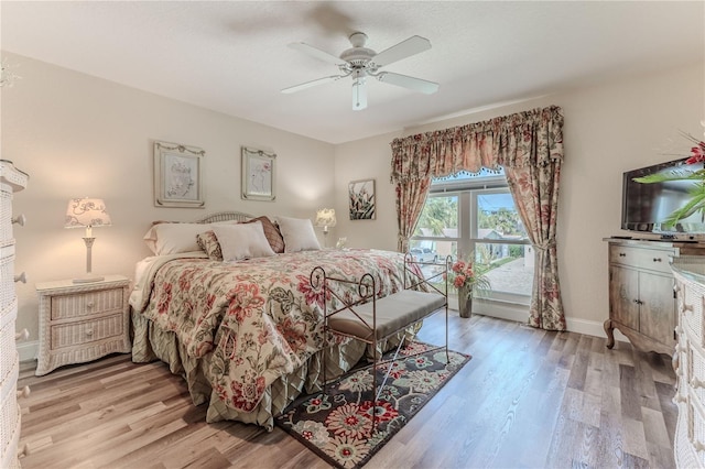 4460 Flounder Dr, Hernando Beach, FL 34607 - bedroom featuring light wood-style floors and a ceiling fan