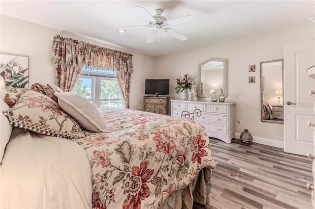 4460 Flounder Dr, Hernando Beach, FL 34607 - bedroom featuring wood finished floors, ceiling fan, and recessed lighting