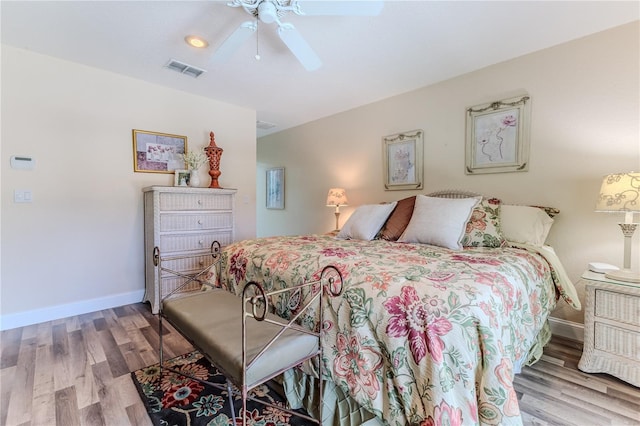 4460 Flounder Dr, Hernando Beach, FL 34607 - bedroom featuring wood finished floors and a ceiling fan
