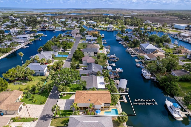 4460 Flounder Dr, Hernando Beach, FL 34607 - aerial view of residential area with a large body of water