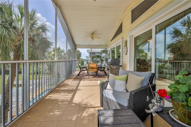 4460 Flounder Dr, Hernando Beach, FL 34607 - sunroom featuring a ceiling fan, outdoor dining space, vaulted ceiling, and an outdoor living space