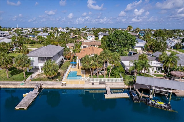 4460 Flounder Dr, Hernando Beach, FL 34607 - aerial view of residential area featuring a pool area and a nearby body of water