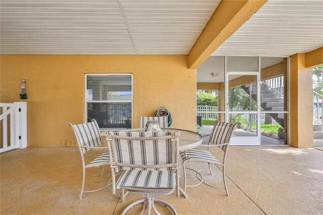 4460 Flounder Dr, Hernando Beach, FL 34607 - view of patio / terrace featuring stairs and outdoor dining area