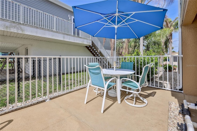 4460 Flounder Dr, Hernando Beach, FL 34607 - patio / terrace with outdoor dining area and stairway