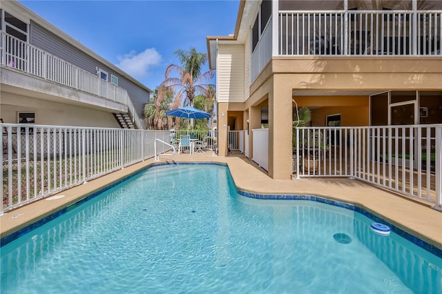 4460 Flounder Dr, Hernando Beach, FL 34607 - community pool featuring a patio and stairway