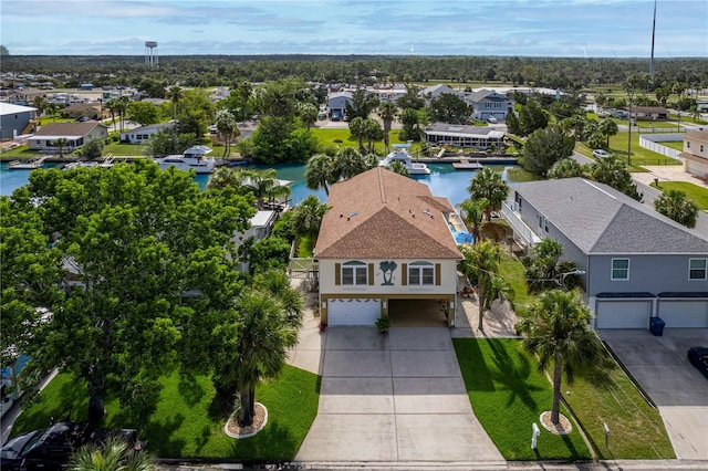 4460 Flounder Dr, Hernando Beach, FL 34607 - aerial perspective of suburban area featuring a large body of water