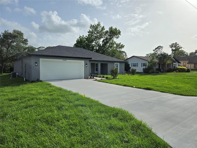 12064 Cradock St, Spring Hill, FL 34608 - single story home with a garage, stucco siding, and a front yard