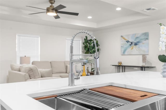 12064 Cradock St, Spring Hill, FL 34608 - living room with a raised ceiling, a ceiling fan, and recessed lighting