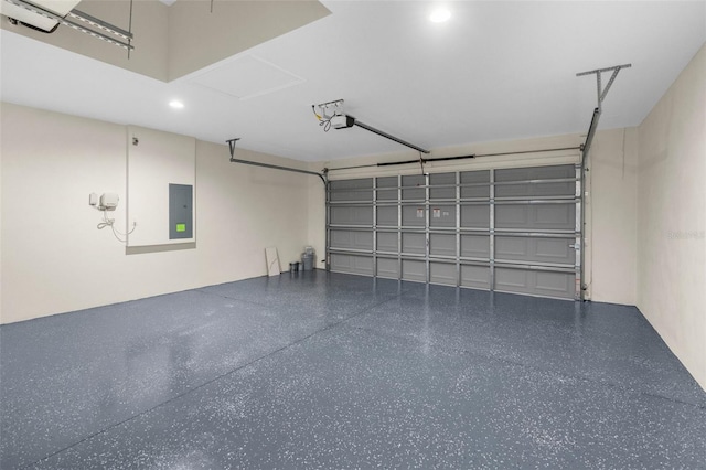 12064 Cradock St, Spring Hill, FL 34608 - garage with electric panel, a garage door opener, and recessed lighting