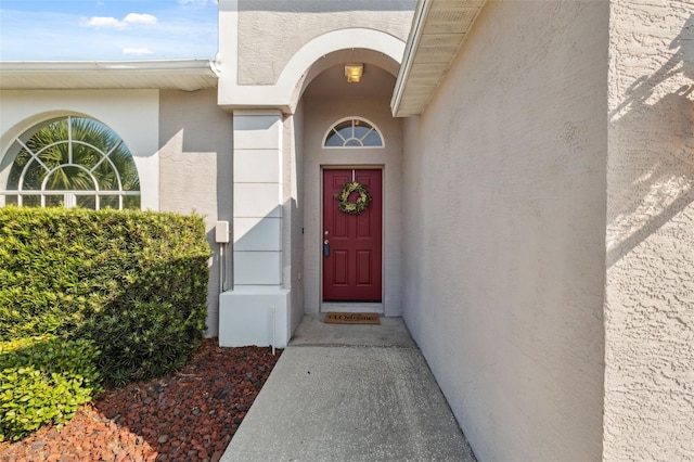 1623 Crossvine Ct, New Port Richey, FL 34655 - doorway to property featuring stucco siding