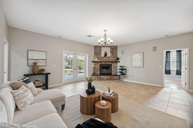 1623 Crossvine Ct, New Port Richey, FL 34655 - living room featuring light tile patterned floors, a chandelier, french doors, and baseboards