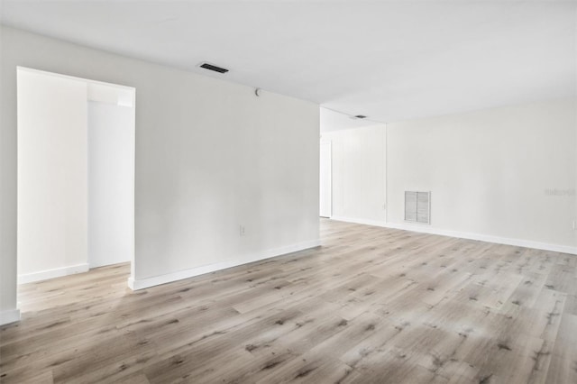 5323 23rd St, Zephyrhills, FL 33542 - empty room featuring light wood-style flooring and baseboards