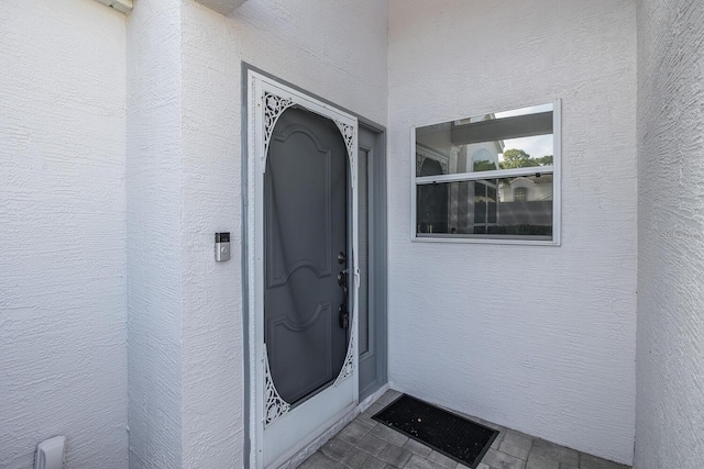 1084 Vista Fina Ct, Spring Hill, FL 34608 - entrance to property with stucco siding