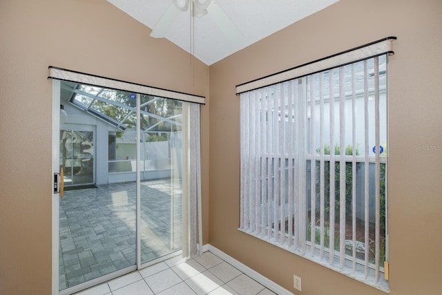 1084 Vista Fina Ct, Spring Hill, FL 34608 - unfurnished room with vaulted ceiling, tile patterned flooring, ceiling fan, and baseboards