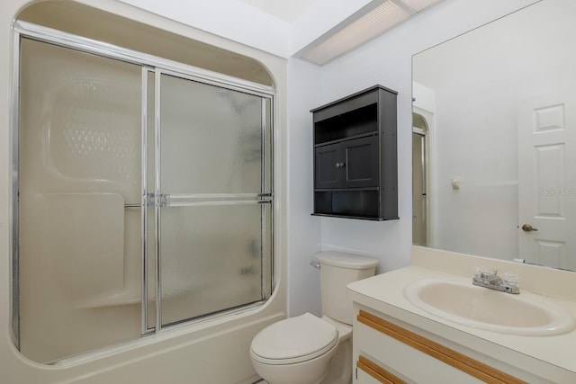 1084 Vista Fina Ct, Spring Hill, FL 34608 - bathroom with vanity, toilet, and shower / bath combination with glass door