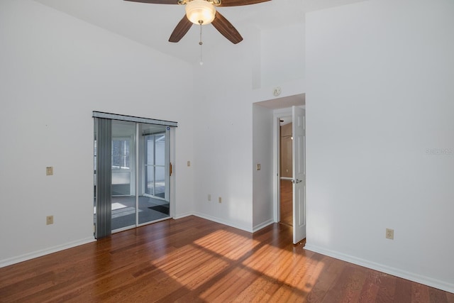 1084 Vista Fina Ct, Spring Hill, FL 34608 - spare room with ceiling fan, wood finished floors, baseboards, and a high ceiling