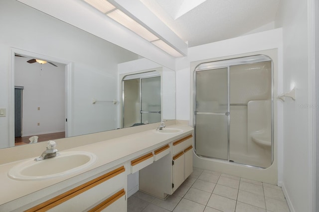 1084 Vista Fina Ct, Spring Hill, FL 34608 - bathroom with double vanity, tile patterned flooring, a shower stall, and ceiling fan