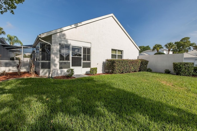 1084 Vista Fina Ct, Spring Hill, FL 34608 - back of property featuring stucco siding