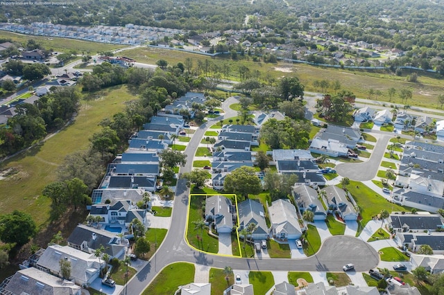1084 Vista Fina Ct, Spring Hill, FL 34608 - aerial overview of property's location with nearby suburban area