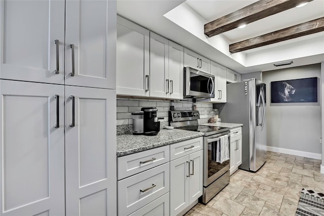4072 Everett Ave, Spring Hill, FL 34609 - kitchen with appliances with stainless steel finishes, backsplash, beamed ceiling, baseboards, and light stone countertops