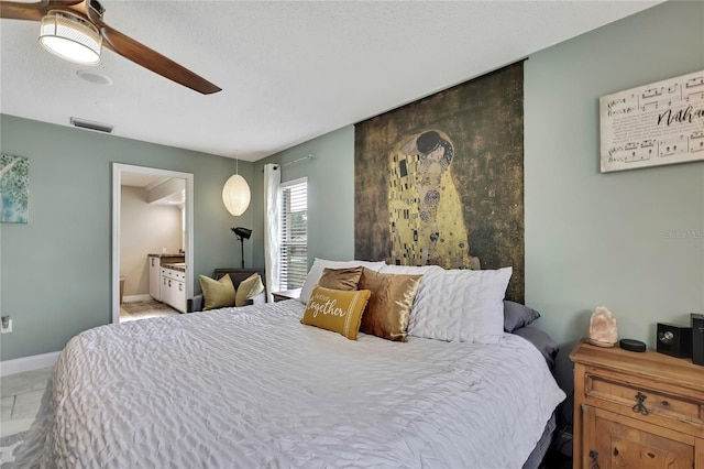 4072 Everett Ave, Spring Hill, FL 34609 - bedroom featuring ensuite bath, baseboards, and ceiling fan
