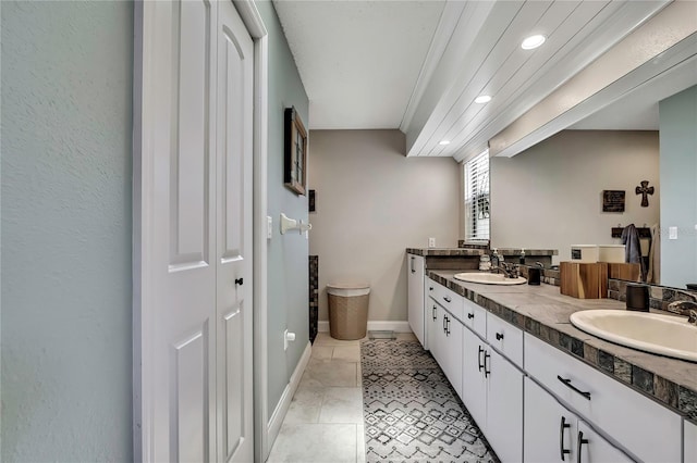 4072 Everett Ave, Spring Hill, FL 34609 - full bathroom with double vanity, baseboards, and recessed lighting