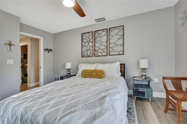 4072 Everett Ave, Spring Hill, FL 34609 - bedroom featuring wood finished floors, baseboards, and ceiling fan