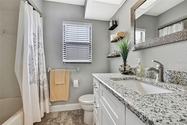 4072 Everett Ave, Spring Hill, FL 34609 - full bathroom with vanity, baseboards, toilet, and shower / bath combination with curtain