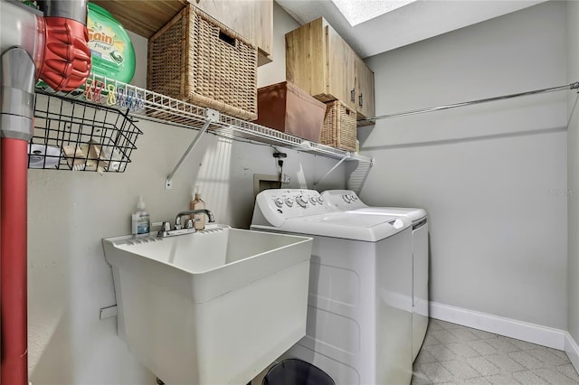 4072 Everett Ave, Spring Hill, FL 34609 - laundry area featuring washer and dryer, baseboards, and tile patterned floors