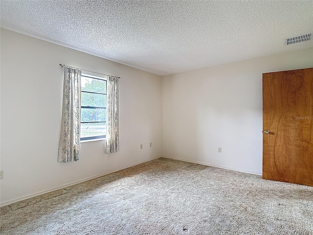 10139 Carrin Rd, Spring Hill, FL 34608 - unfurnished room featuring carpet flooring and a textured ceiling