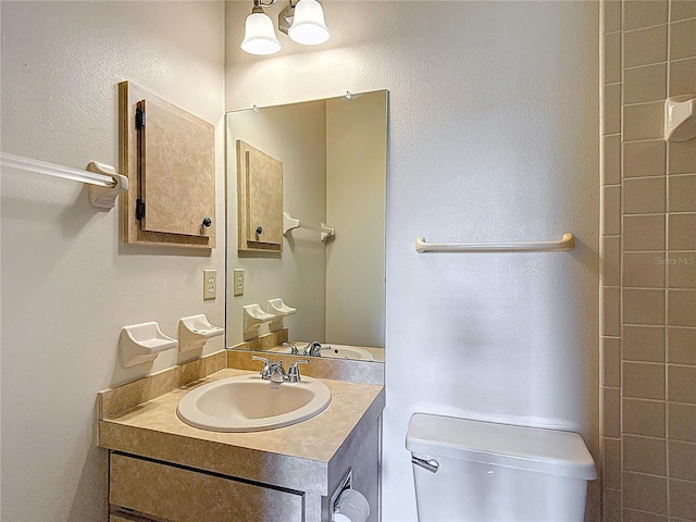 10139 Carrin Rd, Spring Hill, FL 34608 - bathroom with toilet and vanity