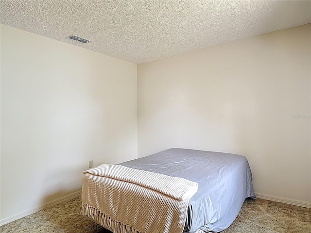 10139 Carrin Rd, Spring Hill, FL 34608 - bedroom with carpet floors and baseboards