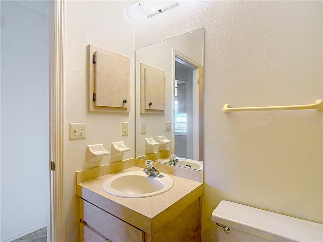 10139 Carrin Rd, Spring Hill, FL 34608 - bathroom featuring vanity and toilet