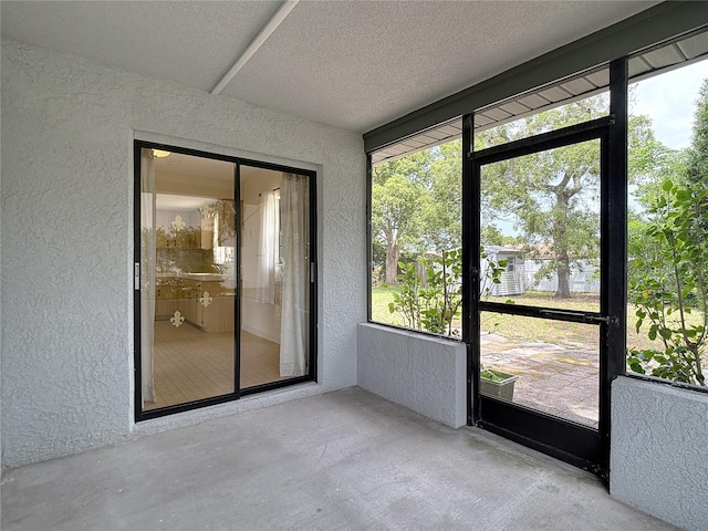 10139 Carrin Rd, Spring Hill, FL 34608 - unfurnished sunroom featuring healthy amount of natural light