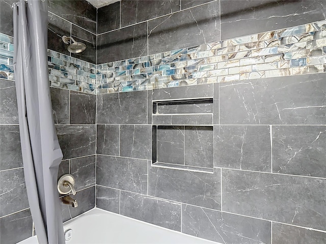 11340 Corinthian St, Spring Hill, FL 34609 - bathroom featuring shower / bath combo with shower curtain
