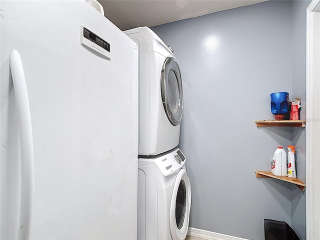 11340 Corinthian St, Spring Hill, FL 34609 - laundry area featuring stacked washer and clothes dryer