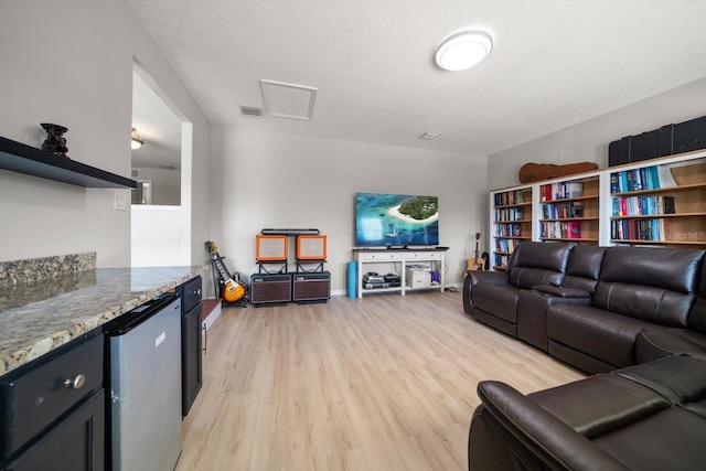 17905 Machair Ln, Land O Lakes, FL 34638 - living room with light wood-style floors and baseboards