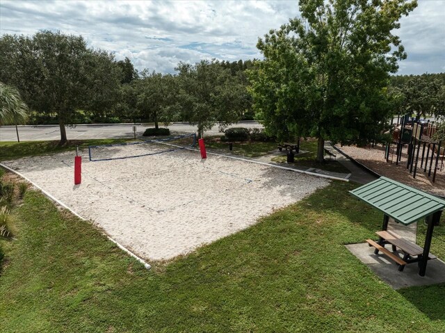 17905 Machair Ln, Land O Lakes, FL 34638 - surrounding community featuring volleyball court and a lawn