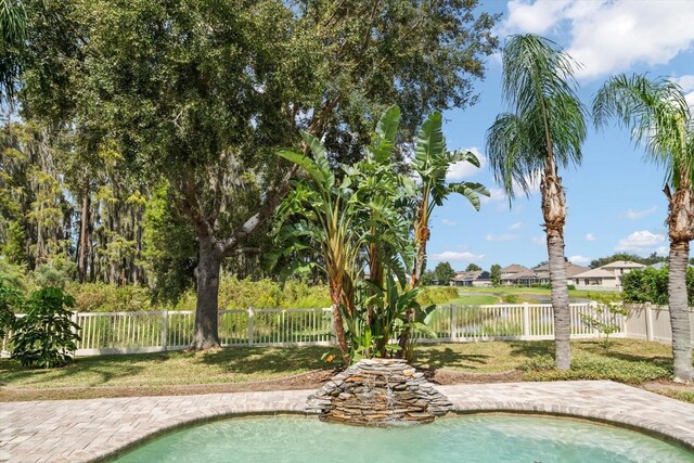 17905 Machair Ln, Land O Lakes, FL 34638 - view of pool featuring a fenced backyard