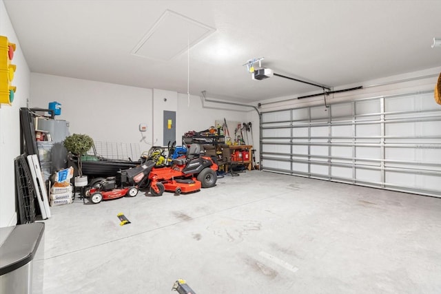 11042 Heth Ct, Weeki Wachee, FL 34613 - garage featuring a garage door opener and electric panel