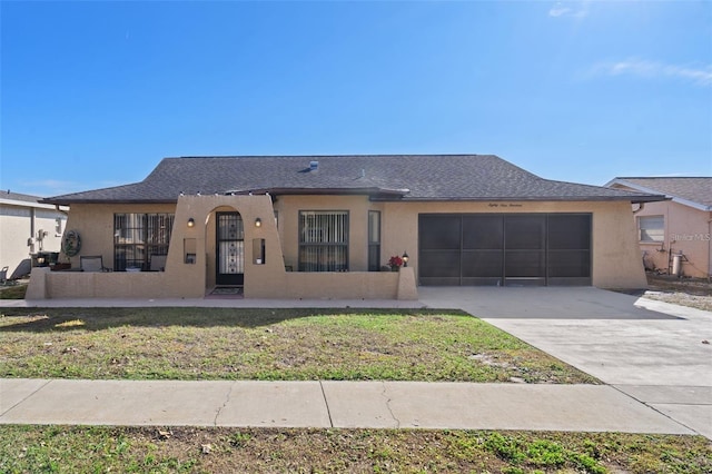 8914 Schrader Blvd, Port Richey, FL 34668 - view of front facade featuring an attached garage, stucco siding, concrete driveway, and a front yard