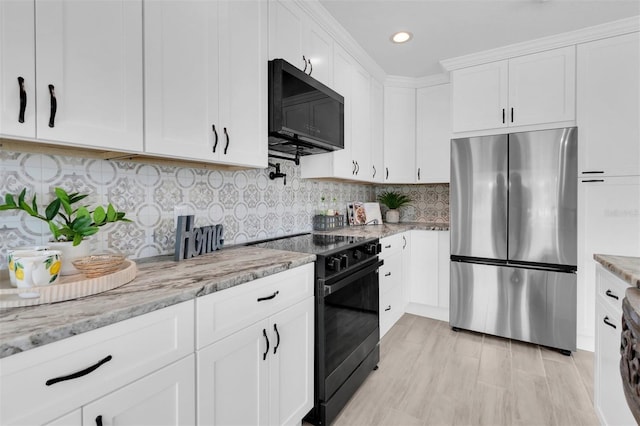 5440 Manatee Point Dr, New Port Richey, FL 34652 - kitchen featuring freestanding refrigerator, electric range, white cabinetry, light stone counters, and recessed lighting