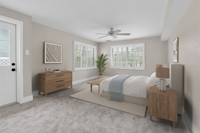 5440 Manatee Point Dr, New Port Richey, FL 34652 - carpeted bedroom featuring baseboards and a ceiling fan