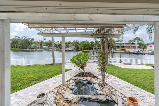 5440 Manatee Point Dr, New Port Richey, FL 34652 - view of patio featuring a water view and a pergola