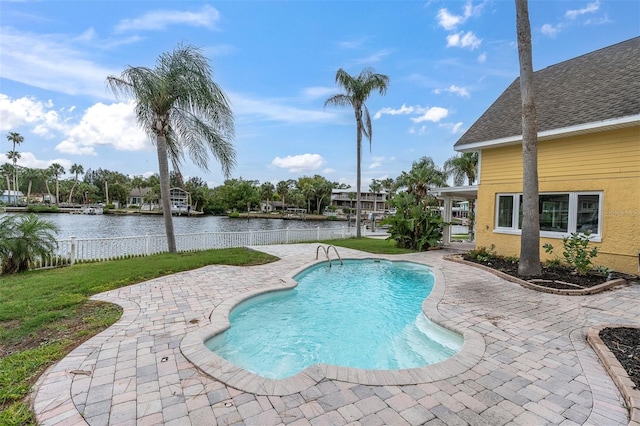 5440 Manatee Point Dr, New Port Richey, FL 34652 - view of pool featuring a patio area and a water view
