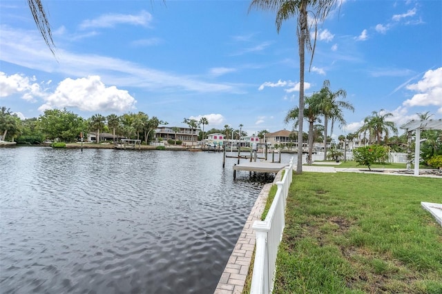 5440 Manatee Point Dr, New Port Richey, FL 34652 - dock area with a water view and a yard